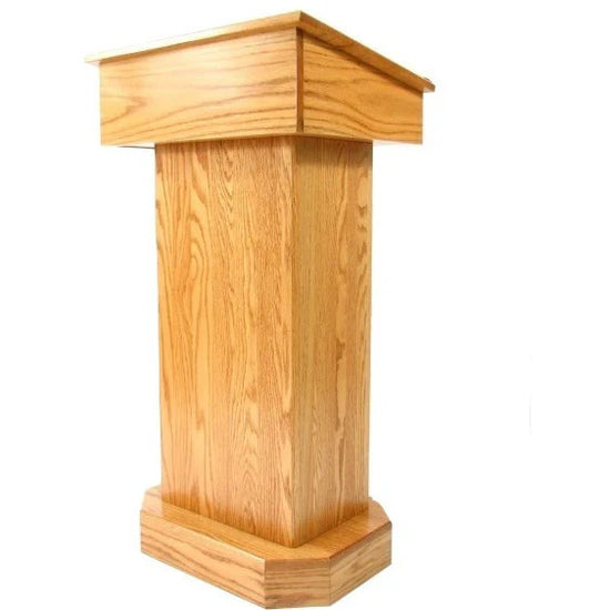  "Senator™ Solid Hardwood Podium, featuring a sleek design made from durable solid wood. It includes a spacious work surface, hidden rear casters for easy mobility, and ample storage space for supplies. Perfect for schools, churches, and event venues." American made craftsmanship Lectern