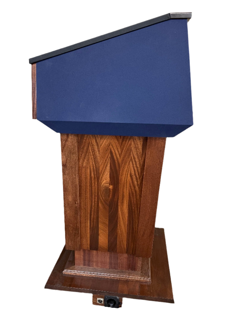 Height-adjustable wooden podium with magnetic front for logos, leather handrails, and a drop-down work surface for presentations.