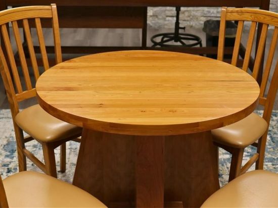 Handcrafted solid cherry wood round collaboration table, 34.5-inch diameter, perfect for executive offices, boardrooms, and upscale workspaces.