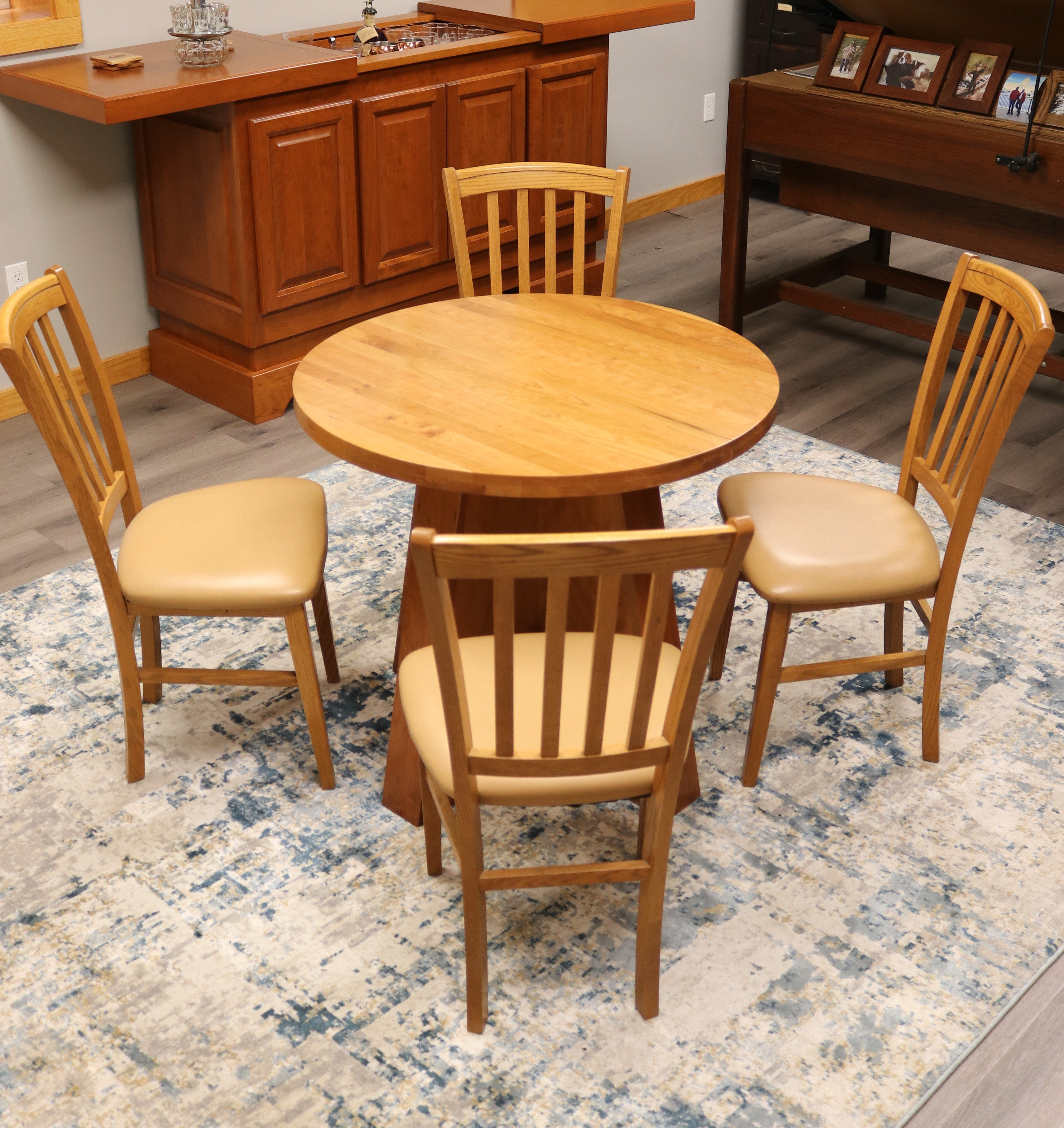 Handcrafted solid cherry wood round collaboration table, 34.5-inch diameter, perfect for executive offices, boardrooms, and upscale workspaces.