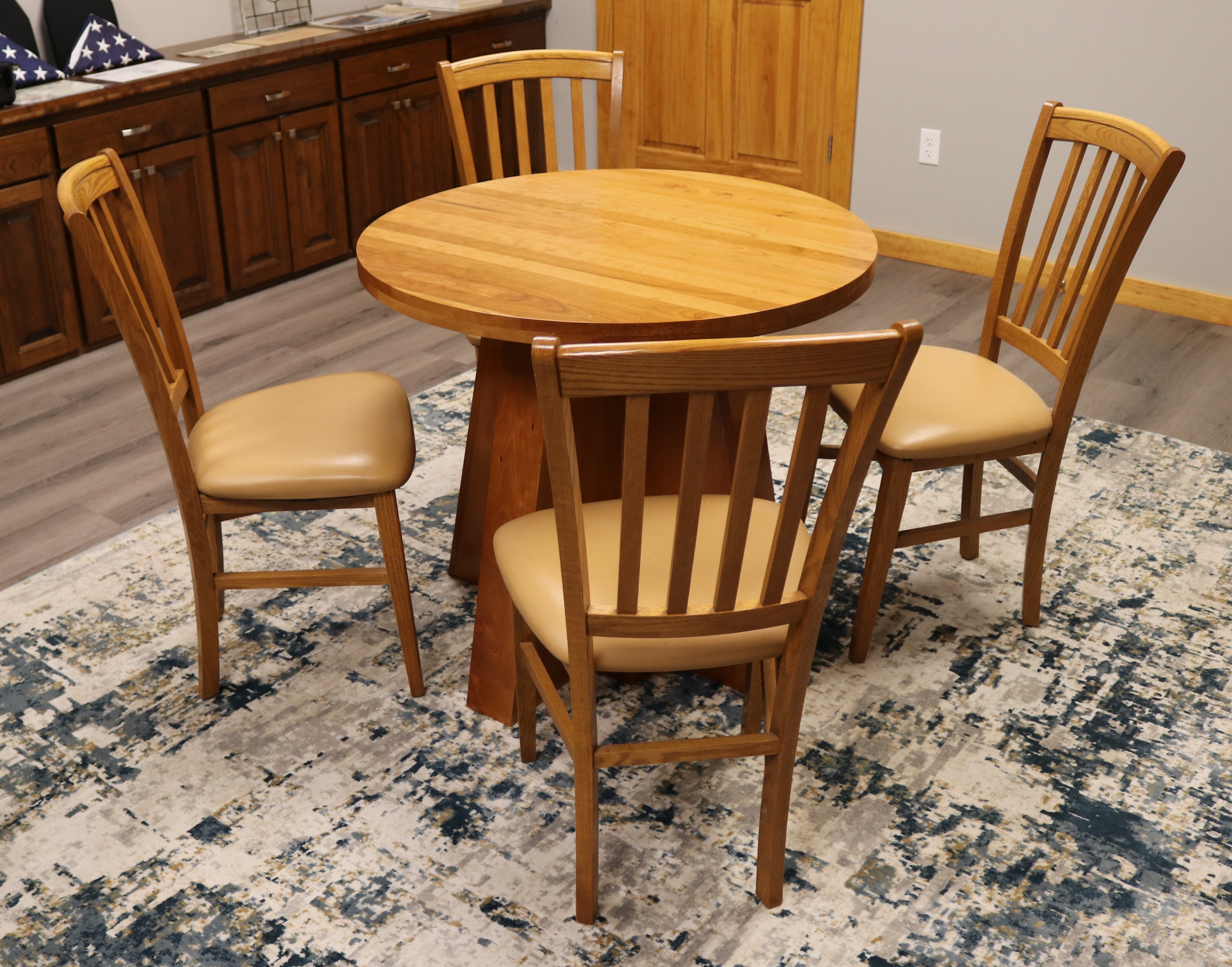 Handcrafted solid cherry wood round collaboration table, 34.5-inch diameter, perfect for executive offices, boardrooms, and upscale workspaces.