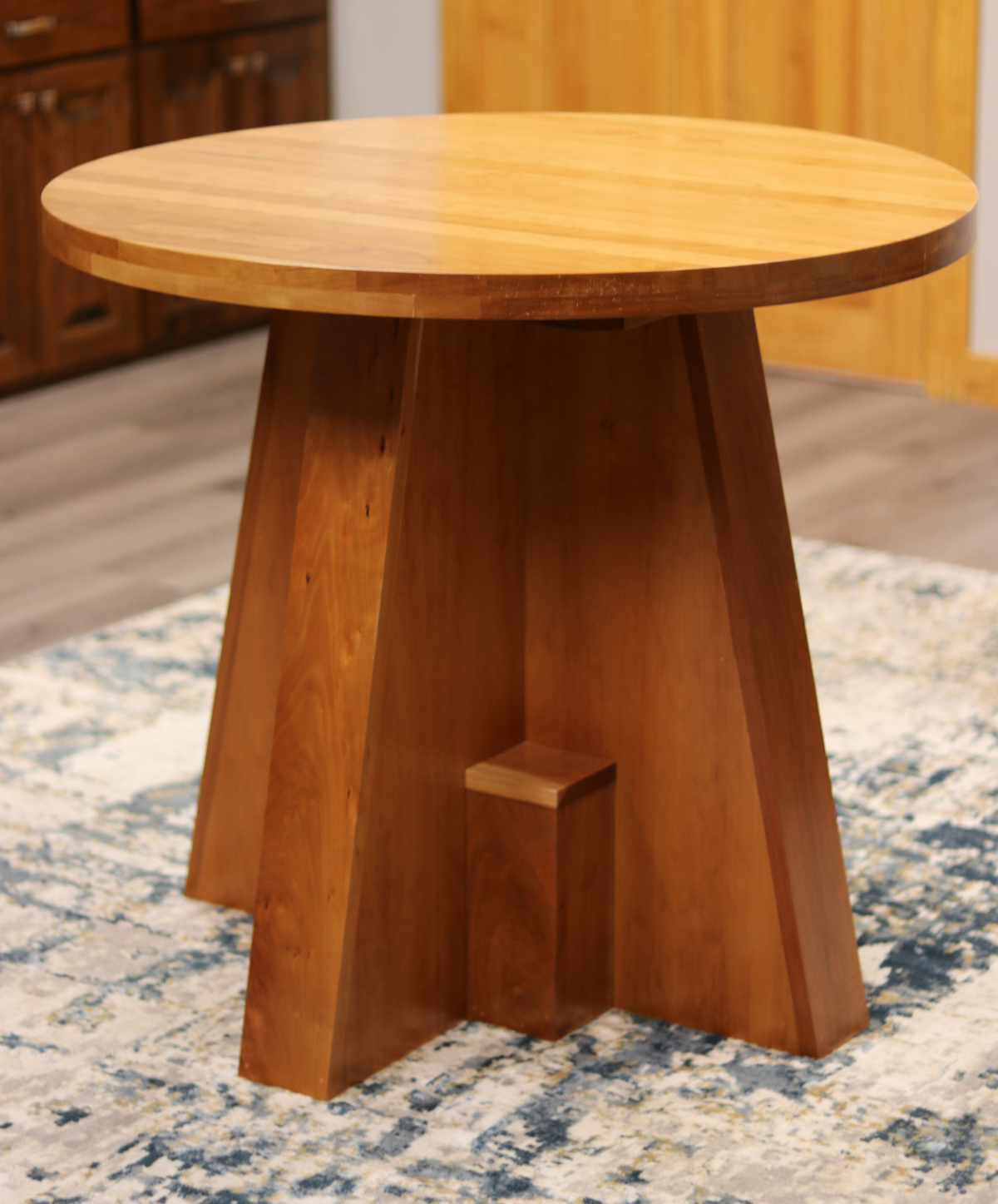 Handcrafted solid cherry wood round collaboration table, 34.5-inch diameter, perfect for executive offices, boardrooms, and upscale workspaces.