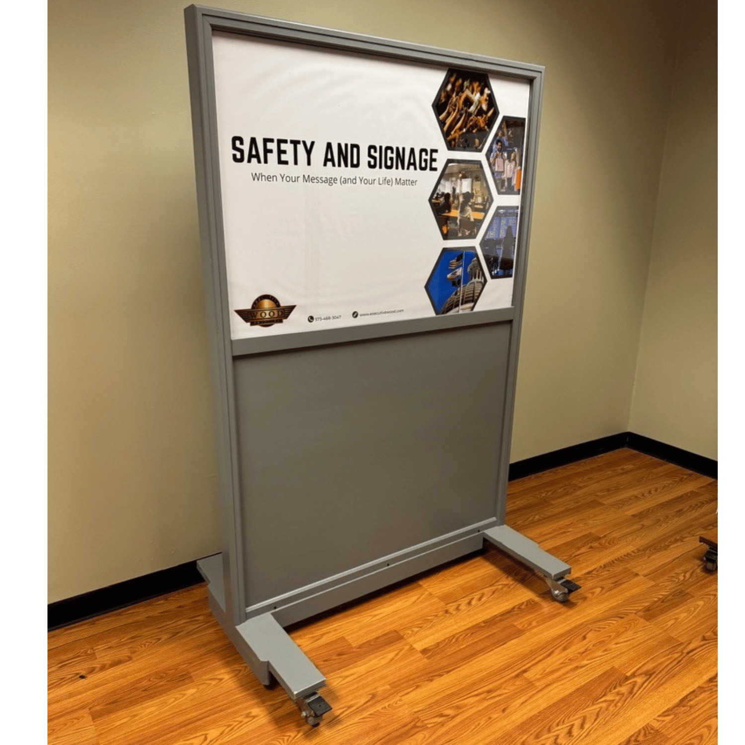 A portable ballistic-resistant panel with a changeable sign. Designed to provide protection in schools, courthouses, and government buildings.