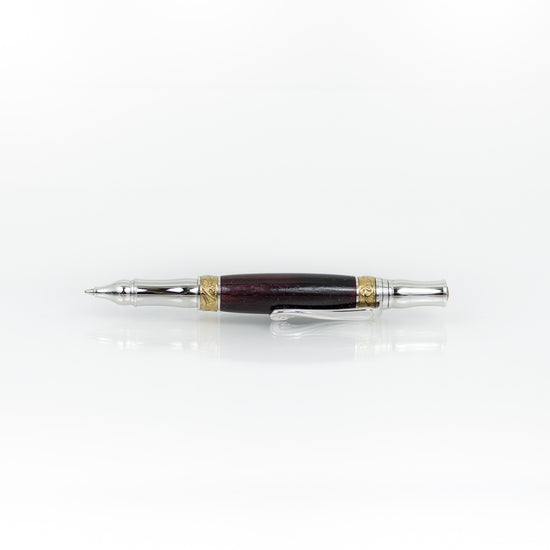 Handcrafted African Blackwood rollerball pen with 24K gold accents