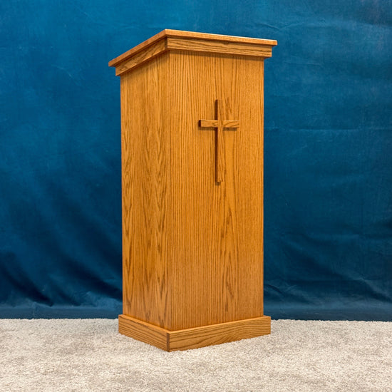 Wooden pulpit with a cross