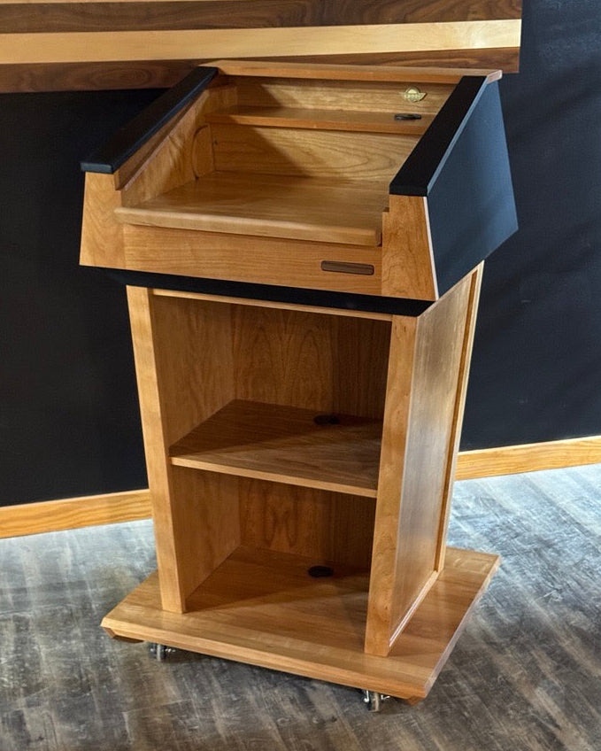 Ballistic wooden podium with a black top 
