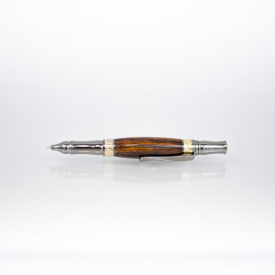 Handcrafted Bocote rollerball pen with 24K gold accents and metal body