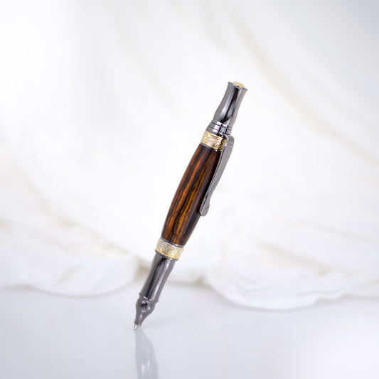 Handcrafted Bocote rollerball pen with 24K gold accents and metal body