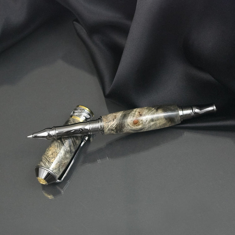 Handcrafted Buckeye Burl rollerball pen with precious metal body
