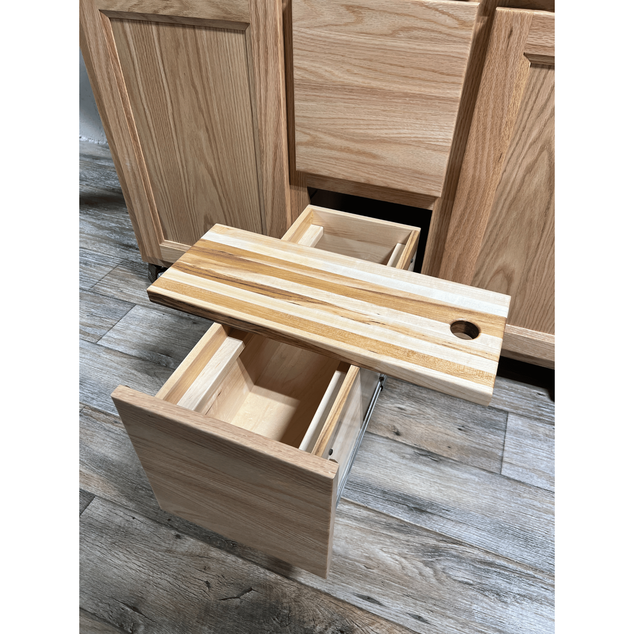Rolling butcher block island with storage, soft-close drawers, knife holder, and locking wheels for kitchen or outdoor use.