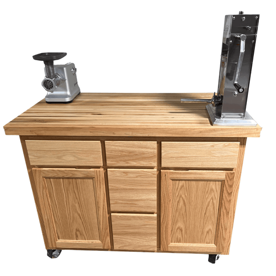 Rolling butcher block island with storage, soft-close drawers, knife holder, and locking wheels for kitchen or outdoor use.