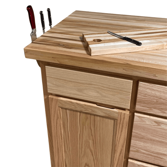 Rolling butcher block island with storage, soft-close drawers, knife holder, and locking wheels for kitchen or outdoor use.