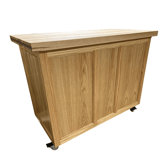 Rolling butcher block island with storage, soft-close drawers, knife holder, and locking wheels for kitchen or outdoor use.