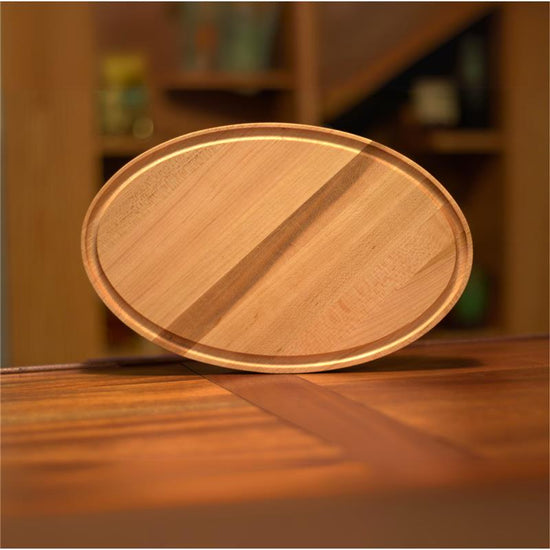 Handcrafted Character Maple cutting board with juice grooves, food-safe finish, and custom engraving options. Made in the USA.