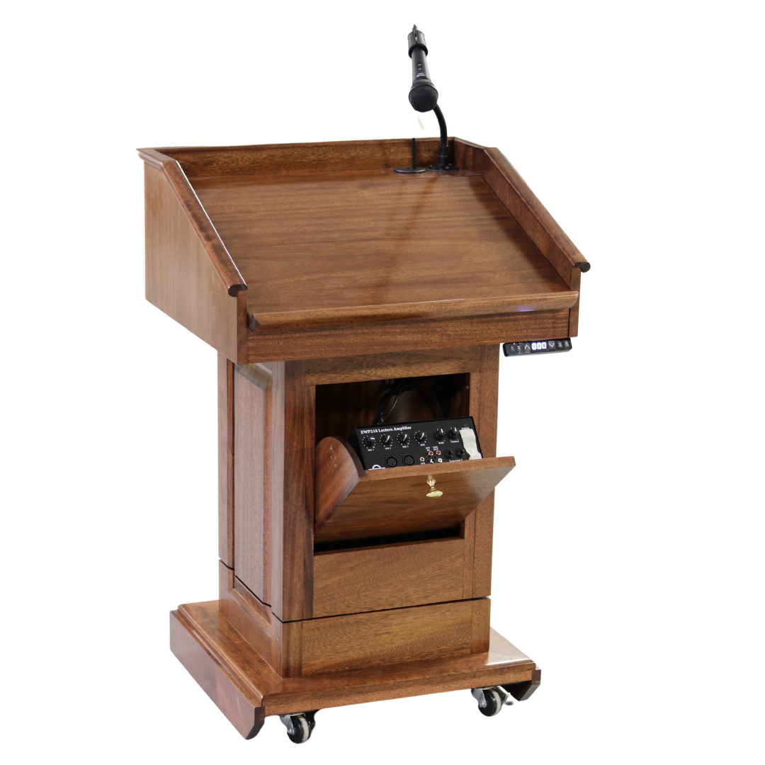 The Counselor Evolution Lift™ podium, handcrafted from premium wood, features power adjustable height, built-in sound system, and casters.