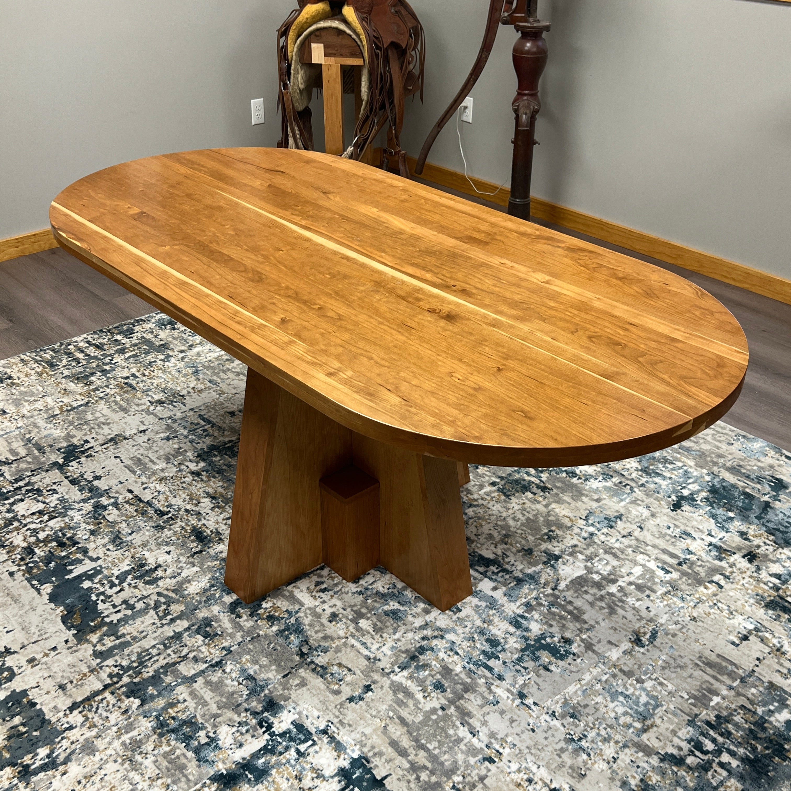 Solid top cherry oval conference table, 72” x 34.5”, handcrafted in the USA for executive offices, boardrooms, and professional spaces.