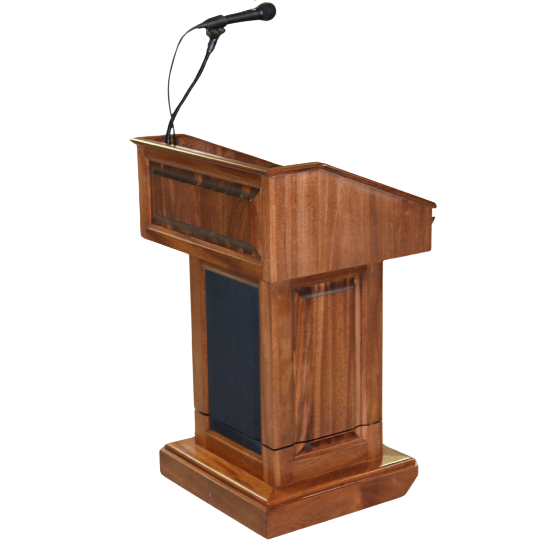 The Counselor Evolution Lift™ lectern, handcrafted from mahogany wood, features adjustable height, built-in sound system, and mobility casters.