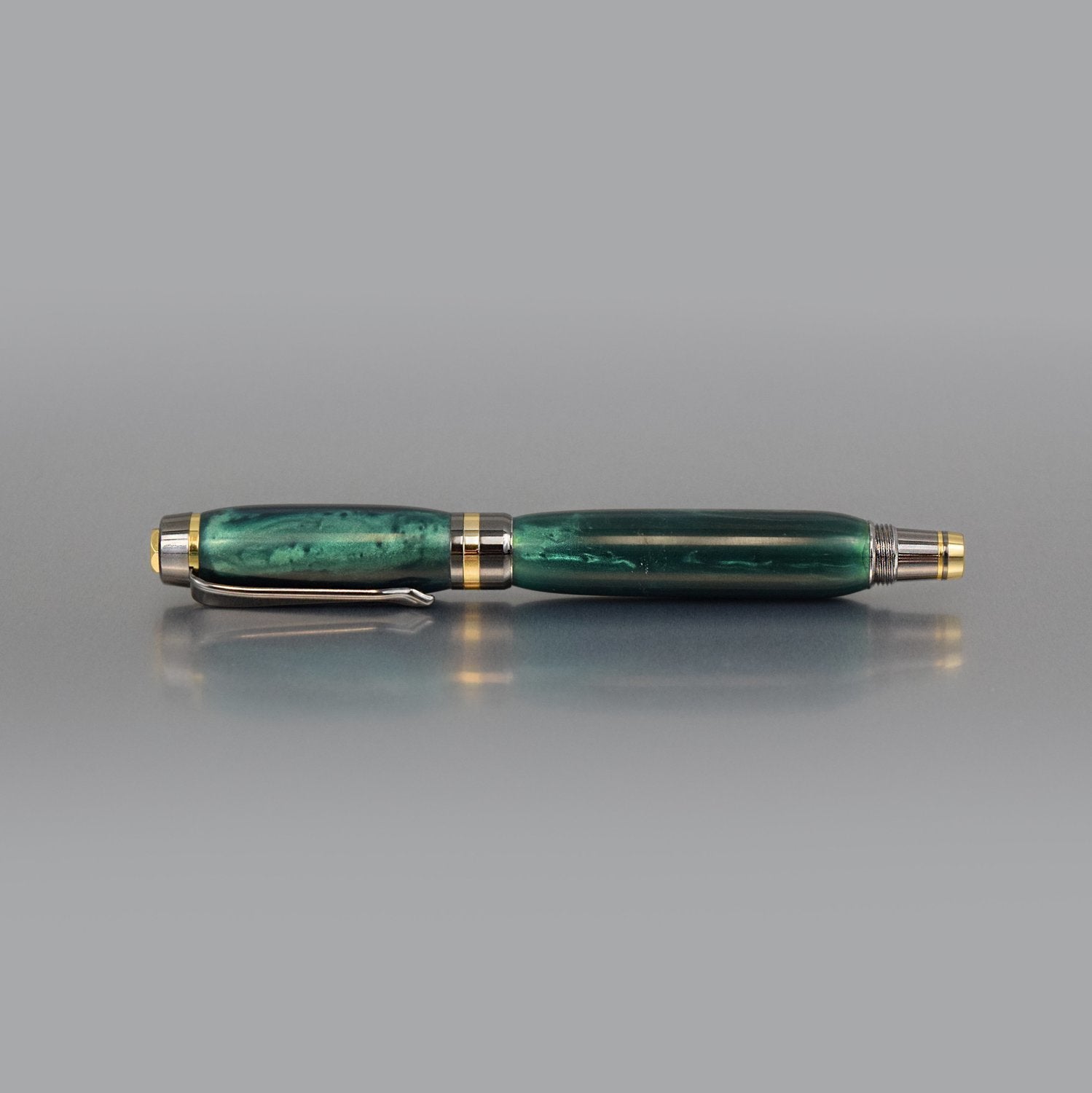 Handcrafted emerald acrylic executive rollerball pen with sleek metal body