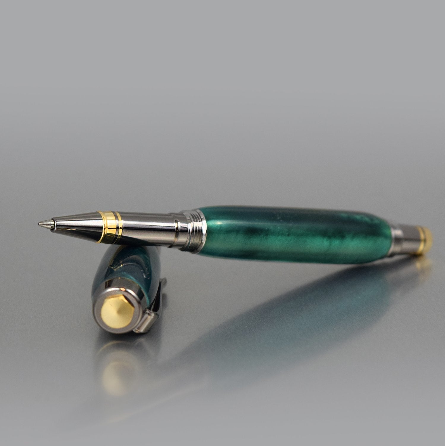 Handcrafted emerald acrylic executive rollerball pen with sleek metal body