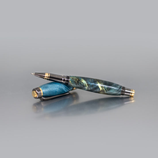Handcrafted Buckeye Burl executive rollerball pen with sleek metal body