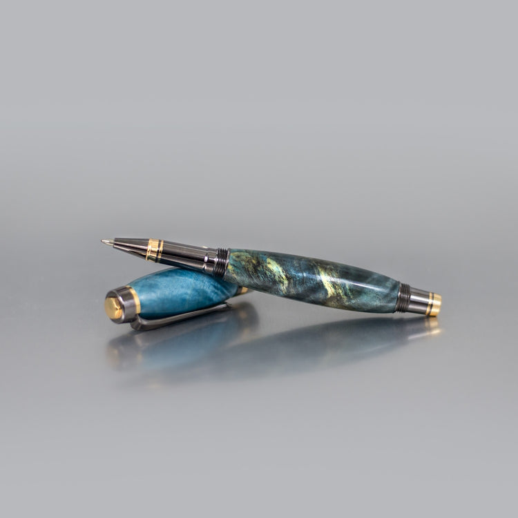Handcrafted Buckeye Burl executive rollerball pen with sleek metal body