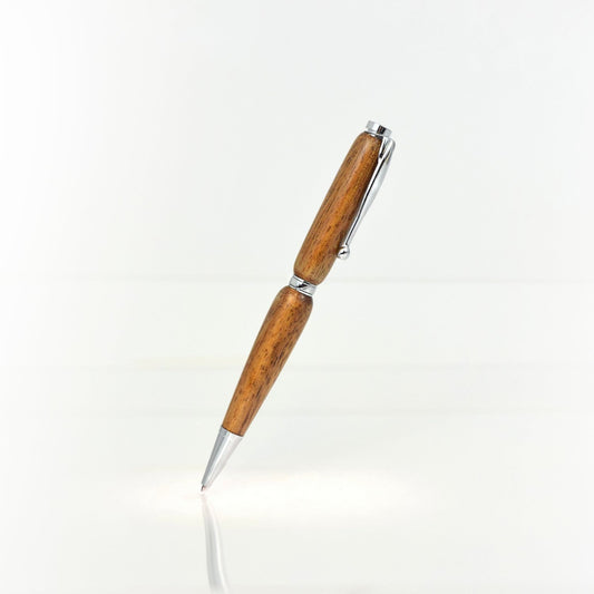 Handcrafted Koa wood pen with high-gloss finish and refillable black ballpoint ink insert
