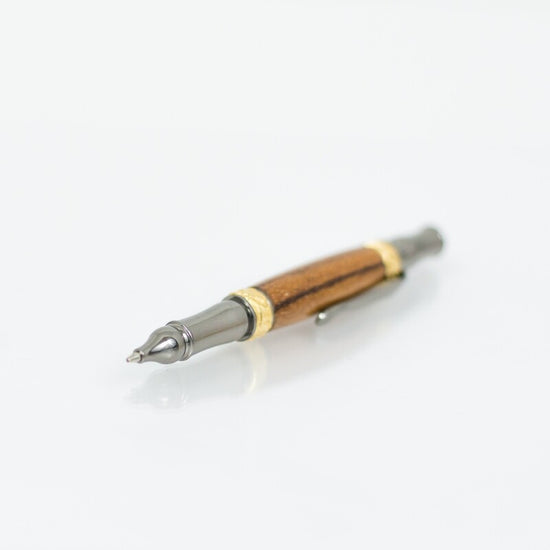 Handcrafted Marblewood rollerball pen with 24K gold accents