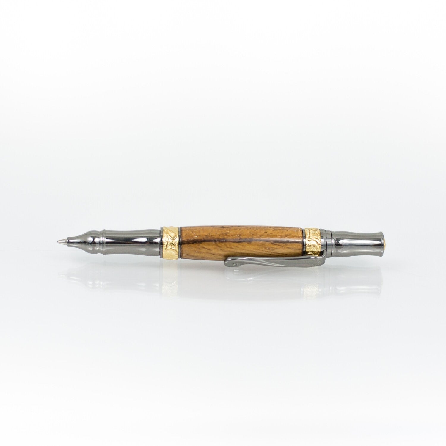 Handcrafted Marblewood rollerball pen with 24K gold accents