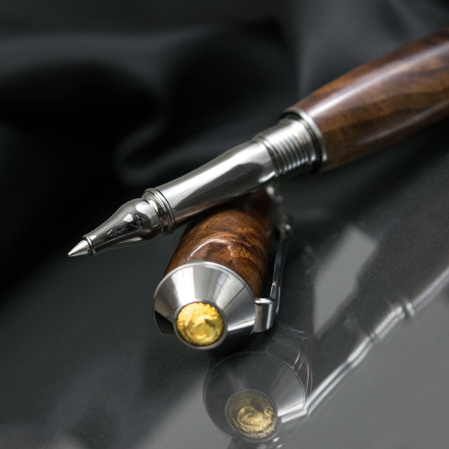 Handcrafted Walnut rollerball pen with precious metal body