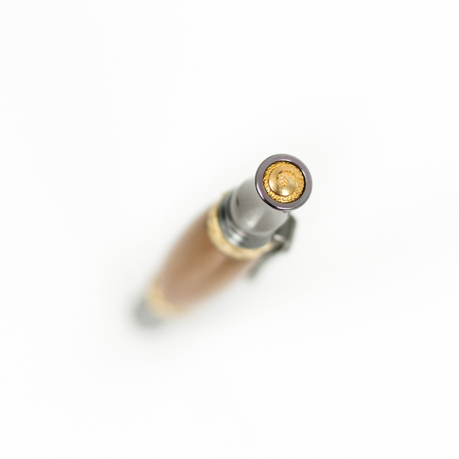 Handcrafted Osage Orange rollerball pen with 24K gold accents and metal body