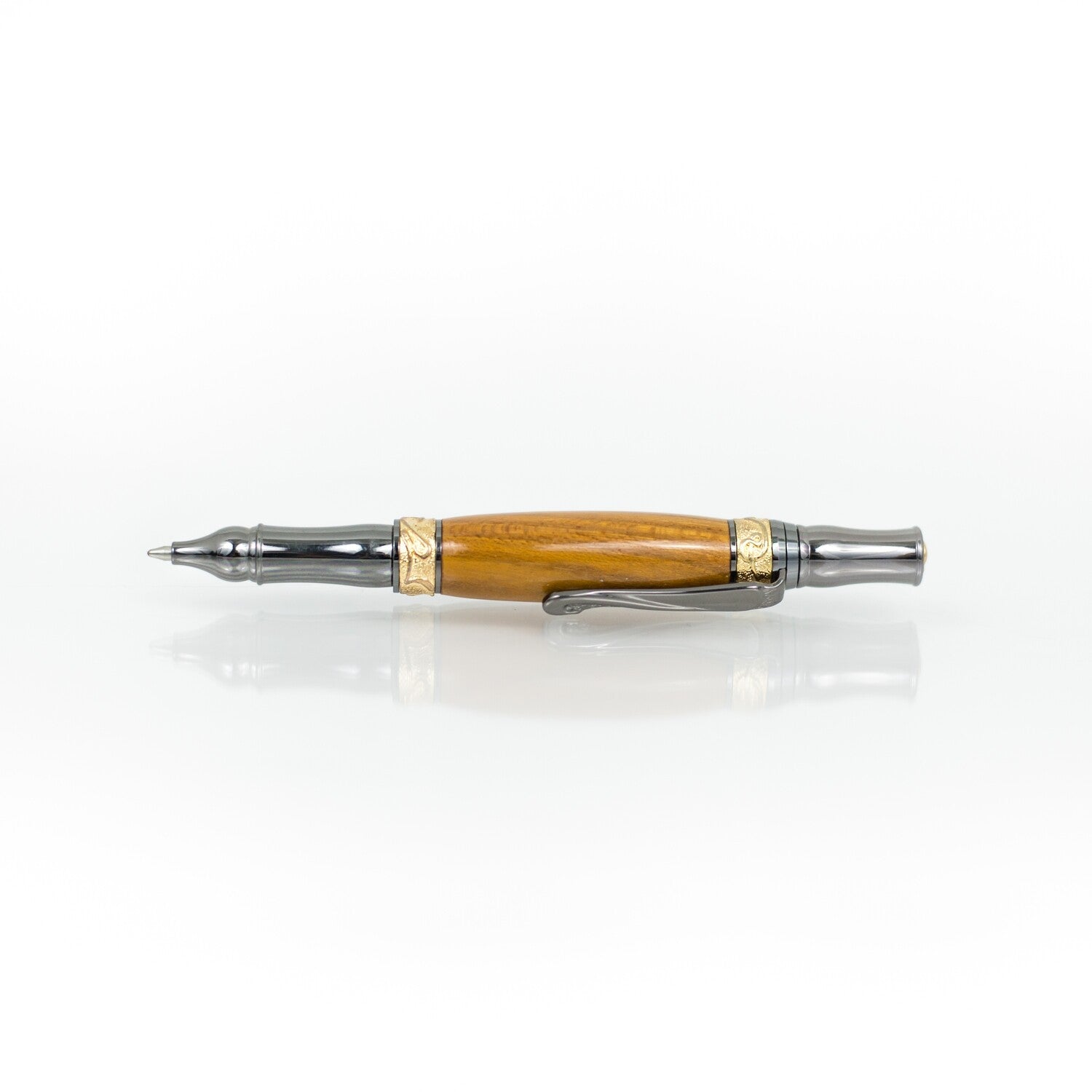Handcrafted Osage Orange rollerball pen with 24K gold accents and metal body