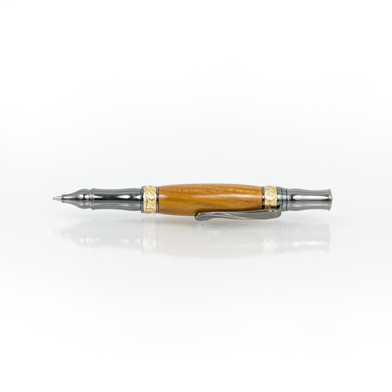 Handcrafted Osage Orange rollerball pen with 24K gold accents and metal body