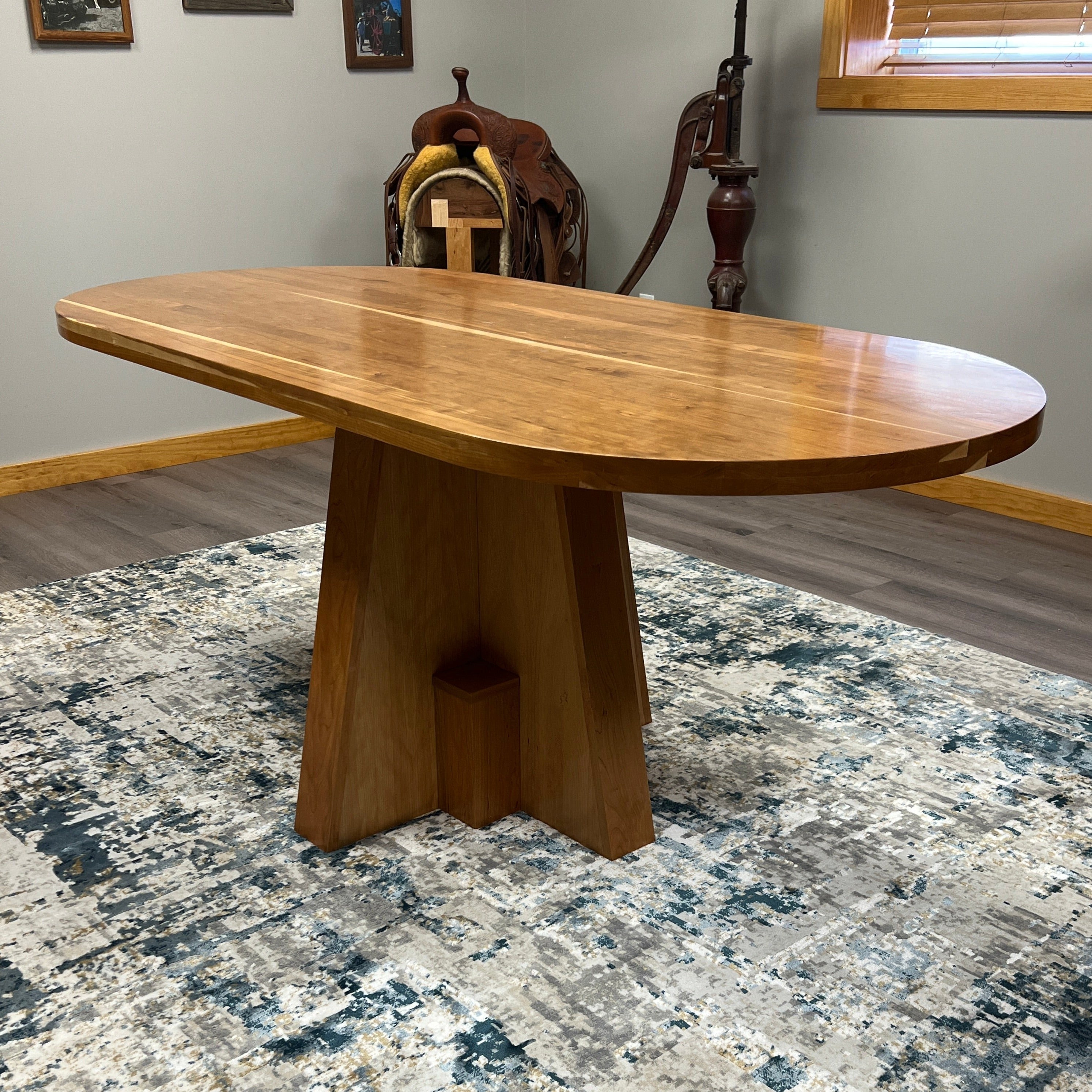 Solid top cherry oval conference table, 72” x 34.5”, handcrafted in the USA for executive offices, boardrooms, and professional spaces.