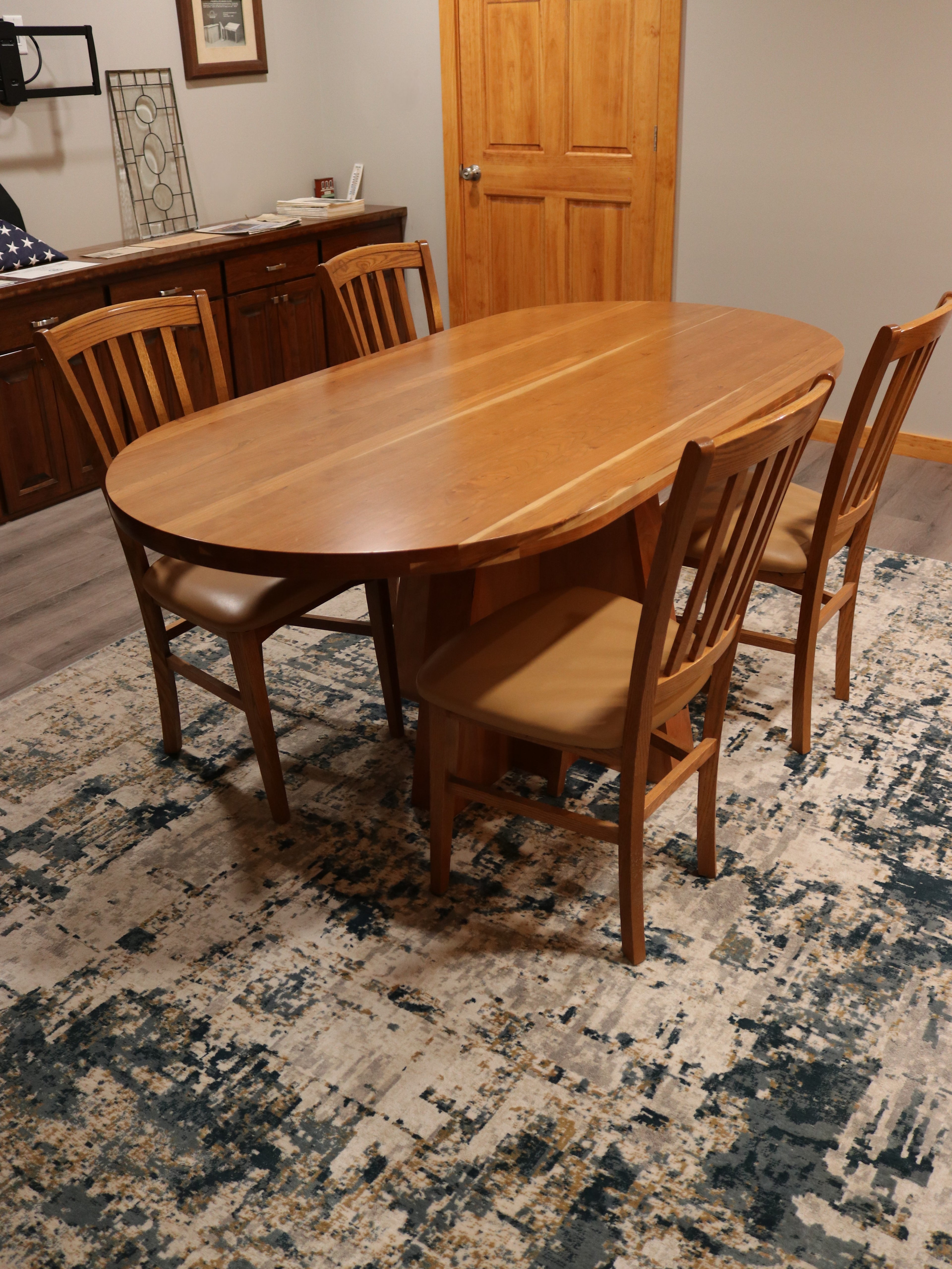 Solid top cherry oval conference table, 72” x 34.5”, handcrafted in the USA for executive offices, boardrooms, and professional spaces.