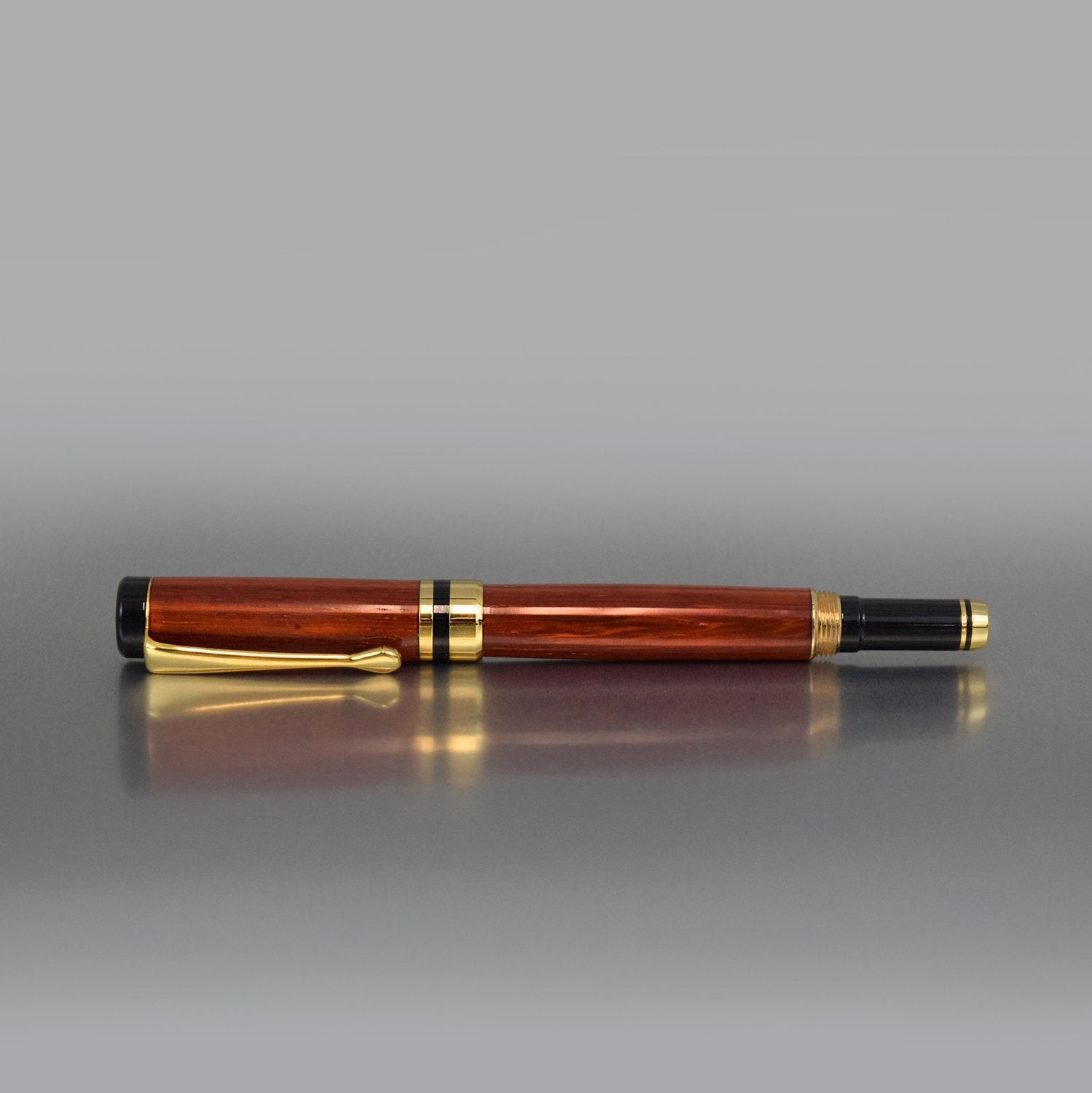 Heirloom-quality Padauk rollerball pen in minimalist design