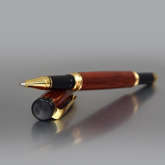 Heirloom-quality Padauk rollerball pen in minimalist design