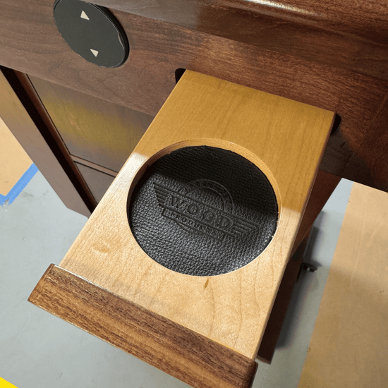 Leather lined Pop-out cup holder for a presidential podium.