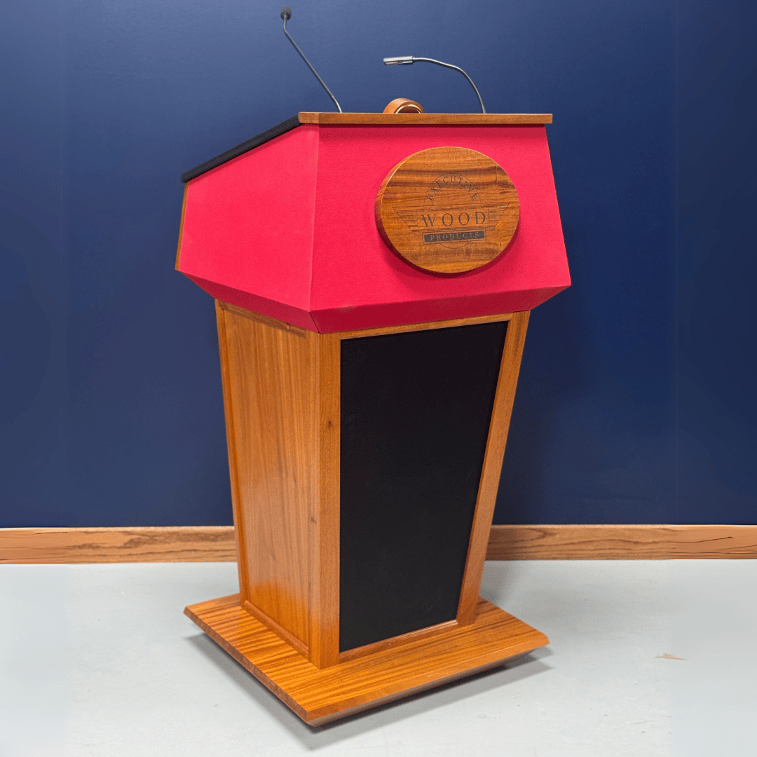 Premium solid wood sound podium with built-in speakers, gooseneck microphone, LED light, magnetic logo system, and pop-out beverage holder.