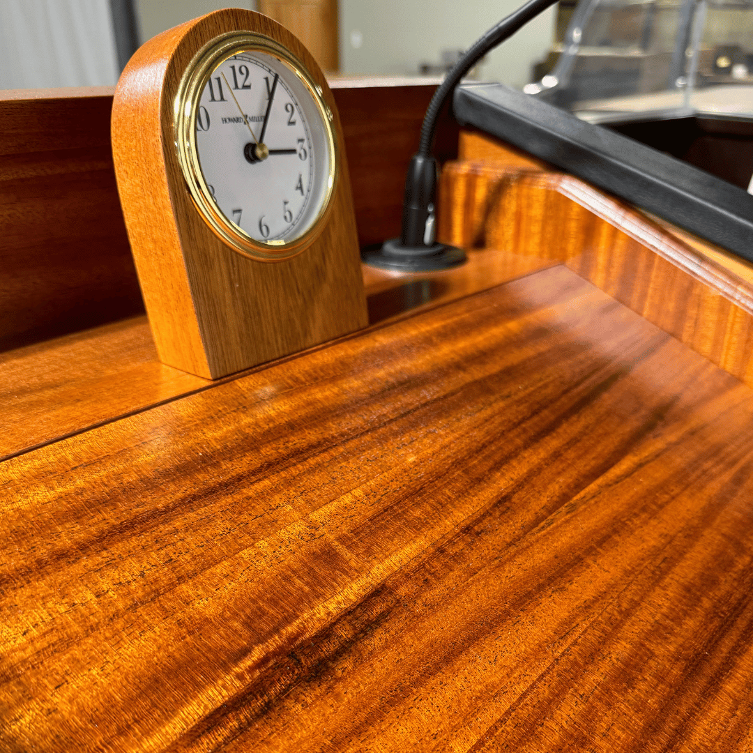 Premium solid wood sound podium with built-in speakers, gooseneck microphone, LED light, magnetic logo system, and pop-out beverage holder.