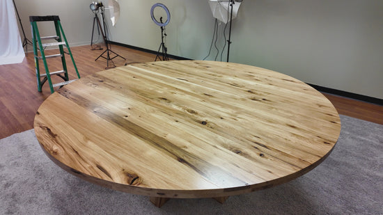 Luxury round conference table handcrafted from solid rustic hickory, 72-inch diameter, perfect for executive offices and dining areas.