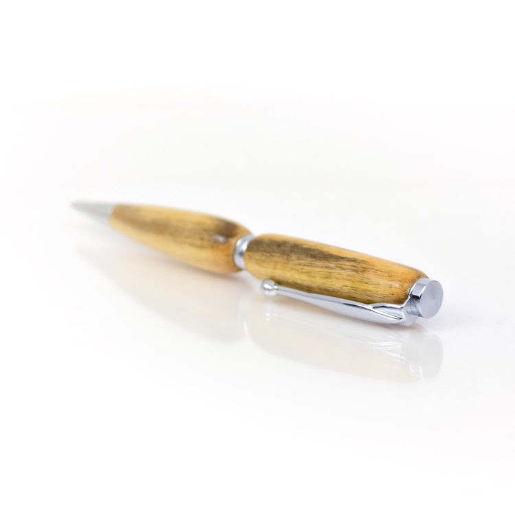 Handcrafted Spalted Maple pen with distinctive dark vein patterns, glossy finish, and refillable black ballpoint ink insert, made in Missouri